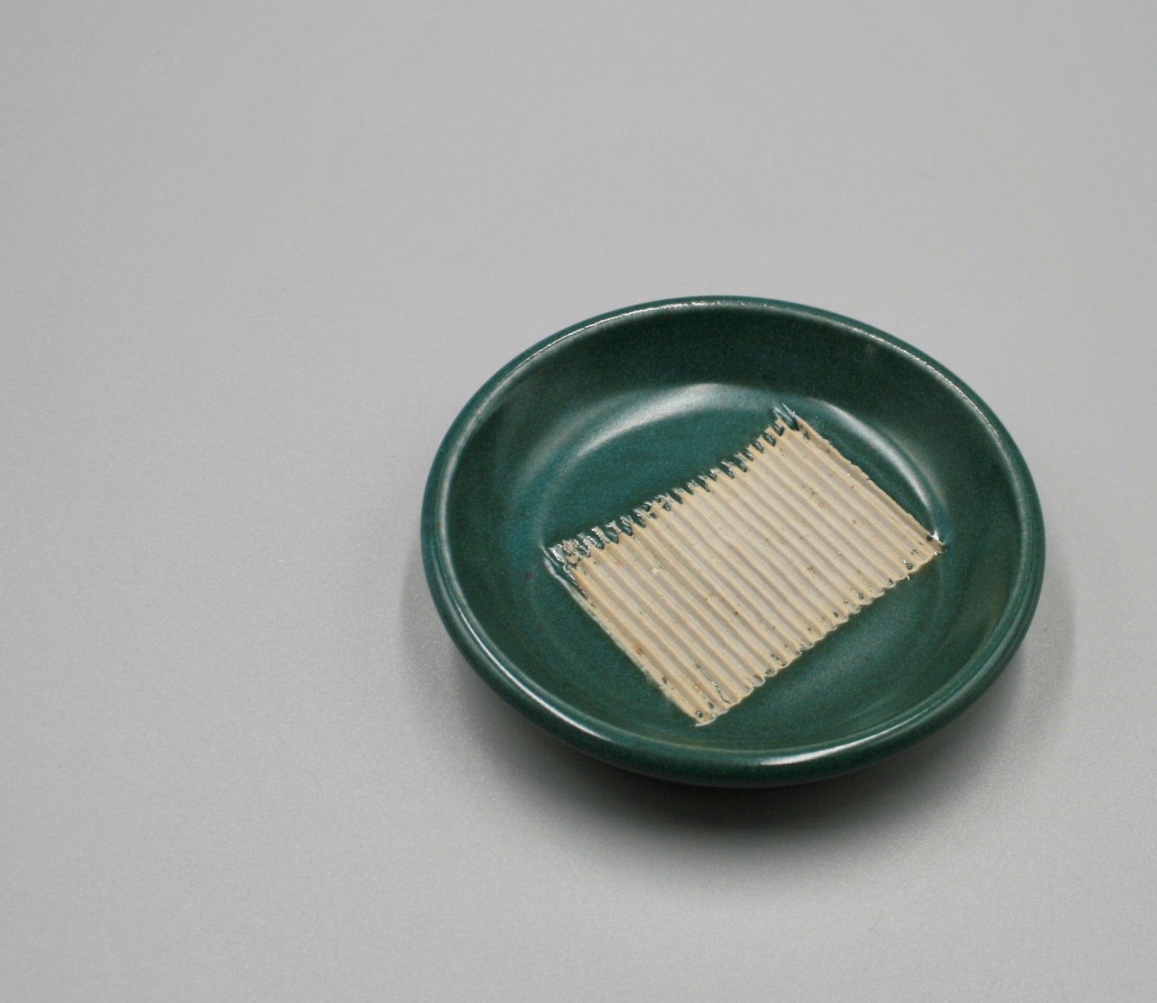 Papercut Pottery: Garlic Grater, Green