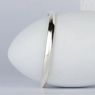 Corey Egan: (W) Bangle, silver aura